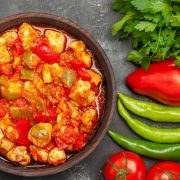 vertical-view-tomato-chicken-soup-different-vegetables-with-greens